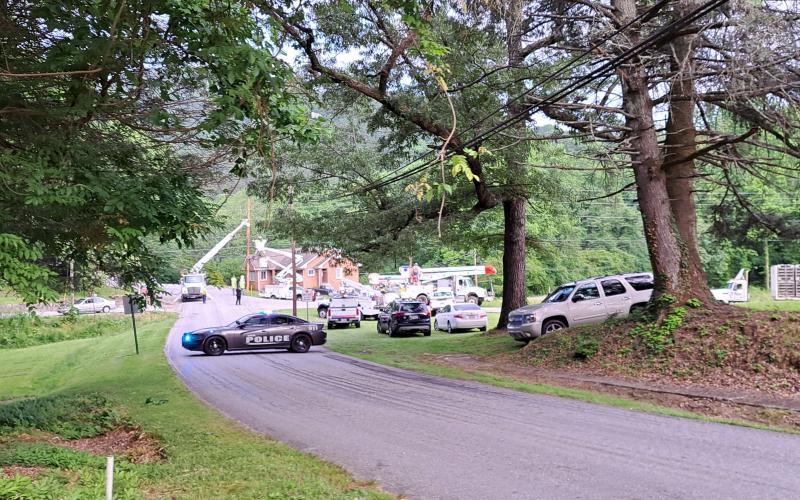 Megan Broome/The Clayton Tribune. Georgia Power crews work to restore power to area neighbors after a Mack truck crash at the intersection of Warwoman Road and Poly Gap Road June 1. Left: Photo courtesy of Clayton Police Department. A Mack truck crashed into a Georgia Power utility pole at the intersection of Warwoman Road and Poly Gap Road in Clayton June 1 around 3:21 p.m. Power was out to area residents for several hours and the section of the road was closed.