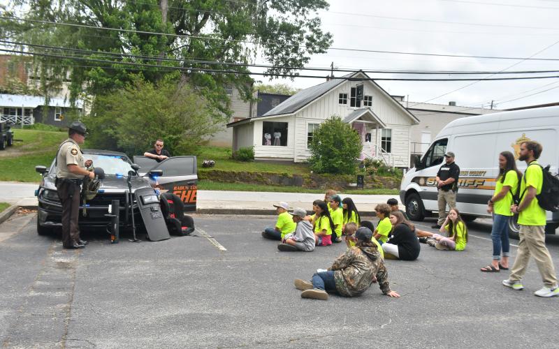Megan Broome/The Clayton Tribune. Rabun County Sheriff’s Office holds demonstrations for Fifth Graders during Government Day and students learned all the services they offer, including learning about the K-9s and handlers.