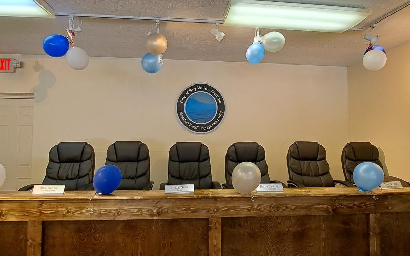 Megan Broome/The Clayton Tribune. City of Sky Valley officials, community members and Forward Rabun/Rabun County Chamber of Commerce cut the ribbon on the new location for Sky Valley City Hall Friday, May 26.