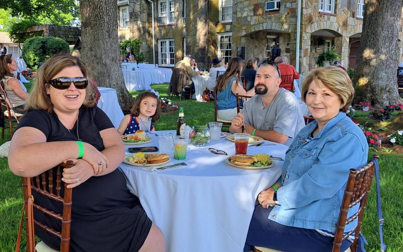 Megan Broome/The Clayton Tribune. Caroline Sparrow, Lola Sparrow, 6, Ronald Sparrow and Becky Price from Springfield, Tenn. enjoy the festivities at The Dillard House.