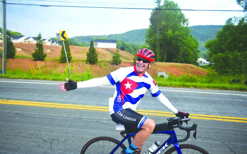 Luke Morey/The Clayton Tribune. Thomas Klamer from St. Simons Island smiles for the camera as he embarks from Clayton City Hall on Sunday morning.
