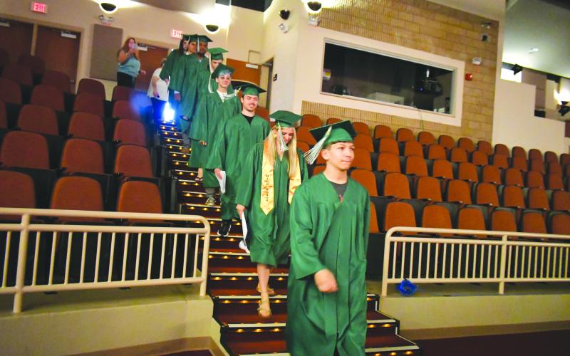 Megan Broome/The Clayton Tribune. MECHS Class of 2023 graduates descended the stairs in the processional “Pomp &amp; Circumstance” at the Rabun County High School Fine Arts Building (FAB) June 15. Graduates were greeted with a standing ovation from friends, family members and school administrators.