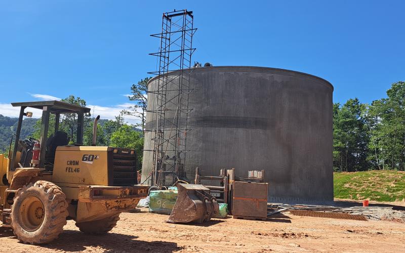 Megan Broome/The Clayton Tribune. Crews continue work on construction of the 750,000 gallon ground-level water storage tank located on Yorkhouse Road in Rabun Gap. It is scheduled to be completed and on line in late September-early October 2023, with a 90-day function testing period to follow.