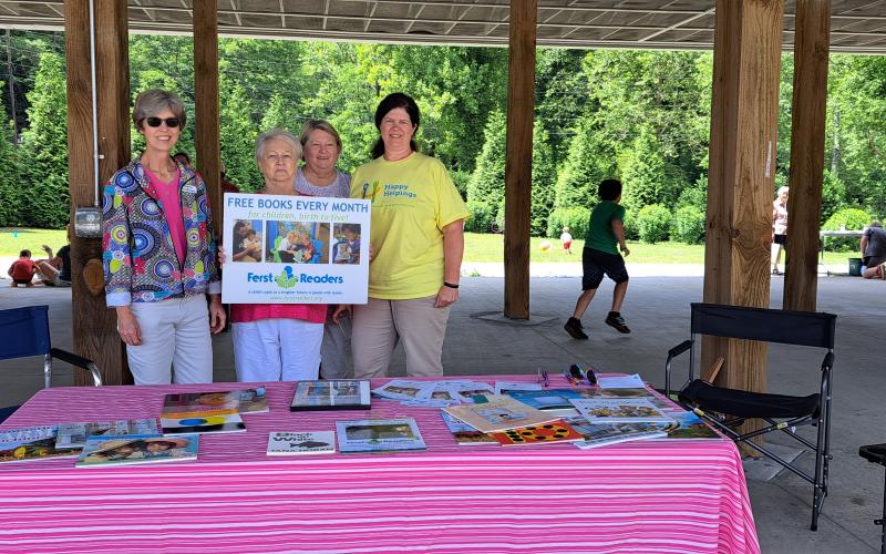 Megan Broome/The Clayton Tribune. Ferst Readers of Rabun County provides information to the community during the Happy Helpings launch, Georgia’s Food Service Program for Kids, at the pavilions behind Rabun County Public Library June 13.
