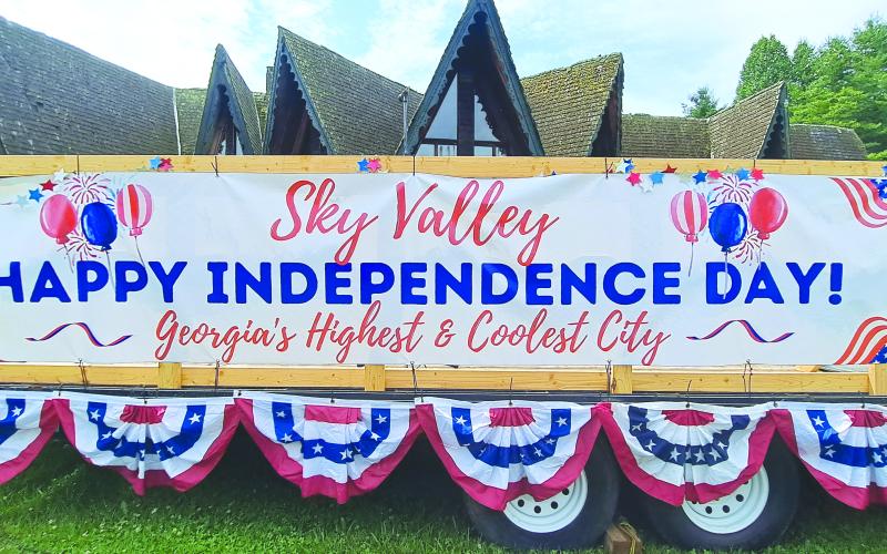 Megan Broome/The Clayton Tribune. The sign says it all: Happy Independence Day from the City of Sky Valley!