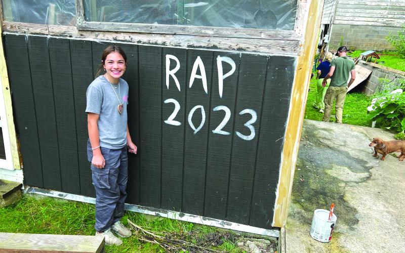 Submitted photo. Ella Lima prepares to repaint a client’s home during the RAP.