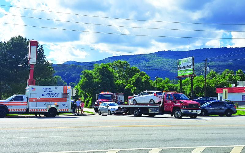 Megan Broome/The Clayton Tribune. Both vehicles were towed away following a two-vehicle crash at Ramey Boulevard June 5 that resulted in minor injuries.