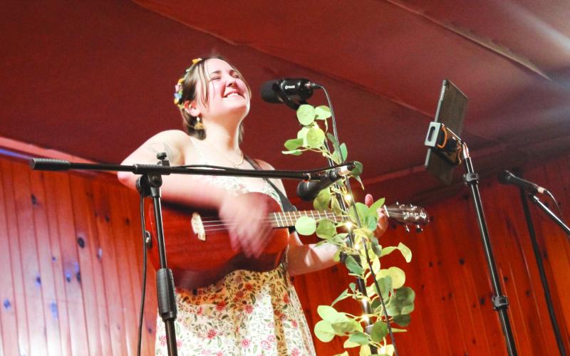 Submitted photo by Kael Bell. Salt Fest host Elena Goodrow performs her original music.