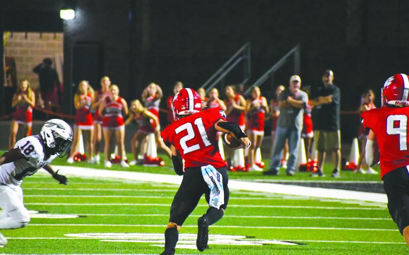 Wade Cheek/The Clayton Tribune. Wildcat senior ATH Paul Picciotti tops off RCHS’s defensive effort with an interception in the late stages of the Wildcats’ 45-13 victory over Heard County. Picciotti currently has offers to play football at Sewanee University and Erskine College.