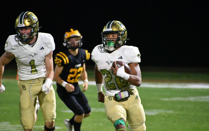 Wade Cheek/The Clayton Tribune. RGNS senior Tyrell Campbell (22) rushed for four touchdowns as the Eagles moved to 2-0 on the season with a 39-6 win.