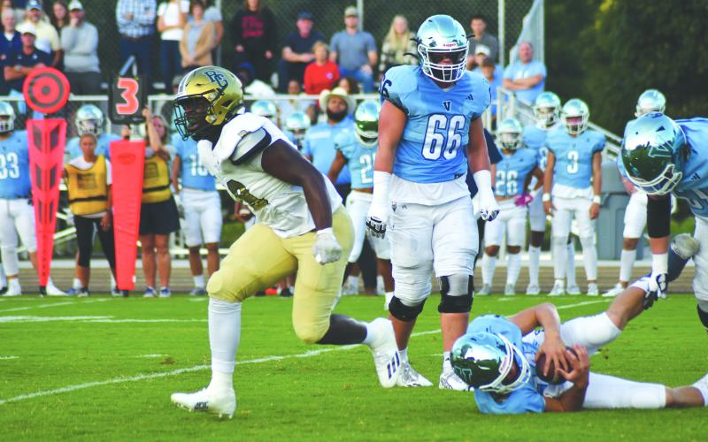 Enoch Autry/The Clayton Tribune. Sophomore James “Tank” Carrington registers one of his three sacks in the game. Carrington now is a five-star and one of the top players in the nation.
