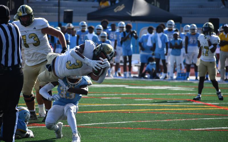 Wade Cheek/The Clayton Tribune. Junior Anthony Quinn Jr. diving into the end zone in the Cam Newton Classic.
