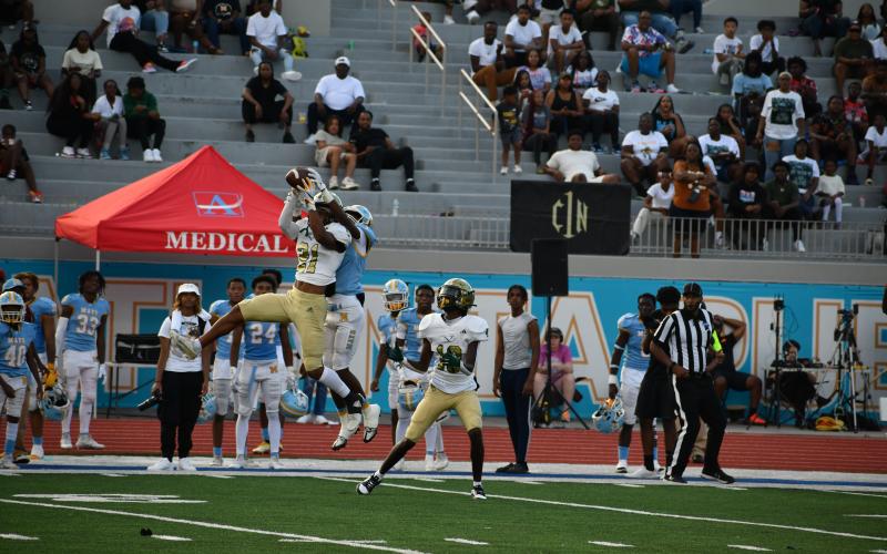 Wade Cheek/The Clayton Tribune. Rabun Gap junior Yussif Kadri picks off Mays High quarterback Semaj Martinez in the final minutes of the Eagles 16-6 victory over the Raiders in the Cam Newton Classic.