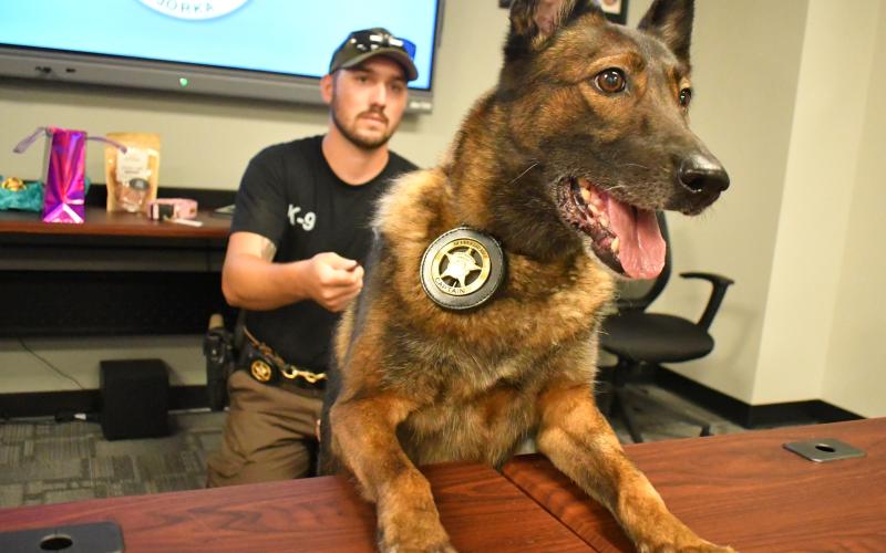 Megan Horn/The Clayton Tribune. K9 Deputy Jorka is officially retired after six years of honorable service at the Rabun County Sheriff’s office. She is 8-years-old and pictured with partner Cpl. Clinton Scott at her retirement reception held Sept. 8.
