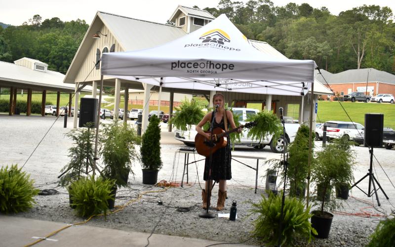 Megan Horn/The Clayton Tribune. Musician/vocalist Krystal Halvorson from Charleston, S.C. entertained the crowd September 14 during the third annual Place of Hope North Georgia Picnic for a Purpose.