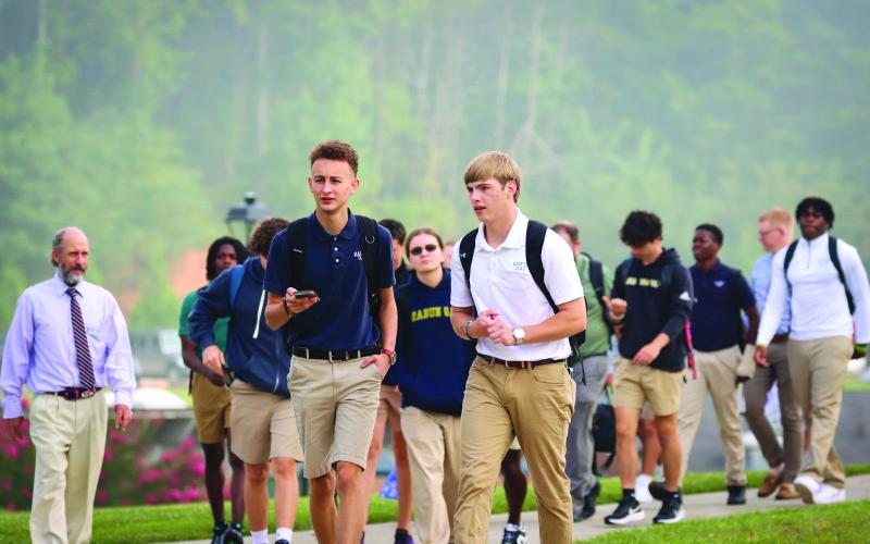 Photo courtesy Rabun Gap-Nacoochee School. Upper School students return to class at Rabun Gap-Nacoochee School. Pictured, front, are Matthew Rivera '25 of Franklin, NC and Andrew Beurmann '25 of Dillard.