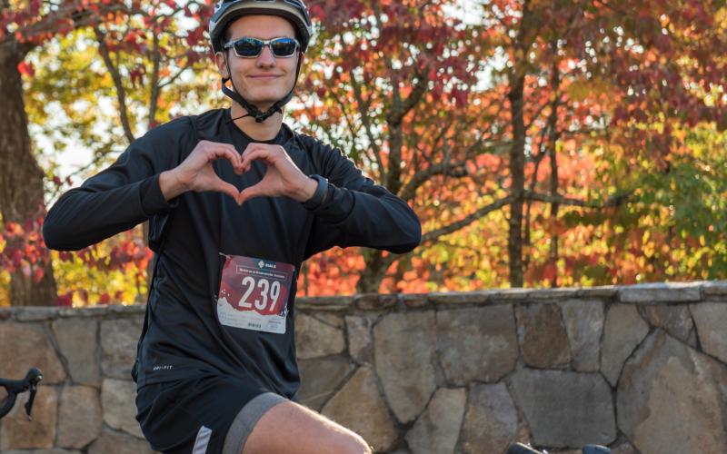 Submitted photo. Alum Simeon Conjagic of Serbia shares his excitement about the ride during the 2022 Twin Rivers Challenge. Conjagic completed the 25-mile route. Registration is ongoing for this year’s Oct. 28 event.