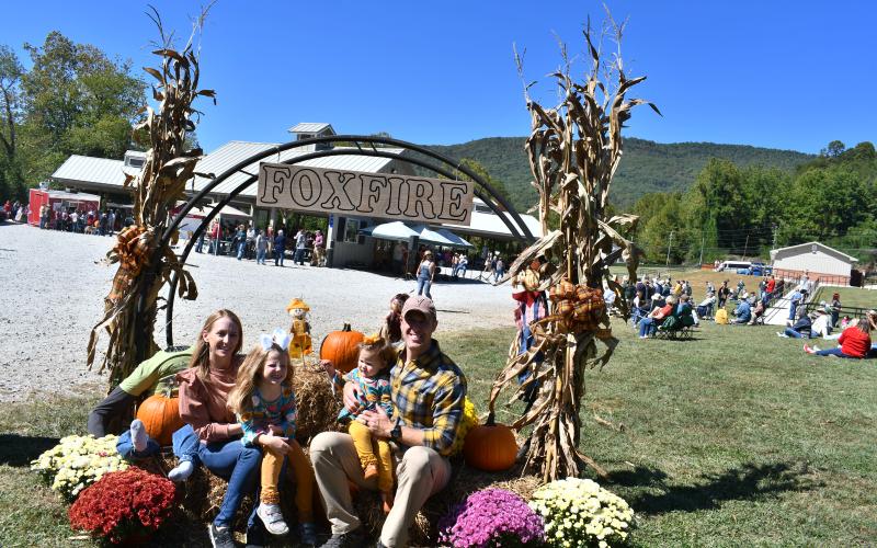 Megan Horn/The Clayton Tribune. Tory and Megan Holton enjoy their family time at the Foxfire Mountaineer Festival with Anniston, 5, and Avery, 1, last Saturday. The annual event was held in downtown Clayton at the pavilions.