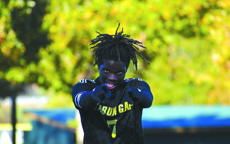 Wade Cheek/The Clayton Tribune. Eagle senior Winfred Sarpong and his RGNS soccer teammates are set to defend their title on Saturday against the No. 1 team in the NCISAA, Wesleyan Christian Academy.