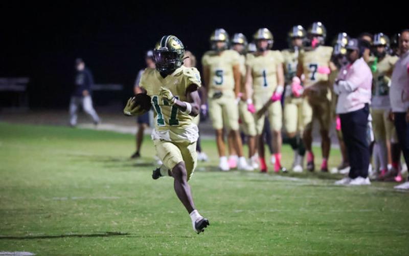RGNS Athletics. Eagle wide receiver Joshua Buckhalter returns RGNS’s second punt-return touchdown in a 57-22 win over the Warriors.