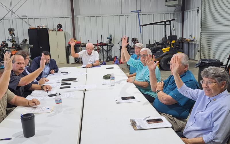 Megan Horn/The Clayton Tribune. RCWSA members vote unanimously in a special called meeting September 28 to consolidate water and sewer services with the city of Clayton.