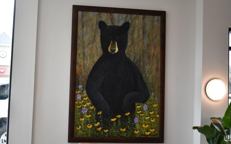 Megan Horn/The Clayton Tribune. Local artists Broderick and Michele Crawford of the Main Street Crawford Art Gallery have their photographs and paintings displayed in all 45 rooms of the Bridge Creek Inn, 210 pieces with three lobby pieces.