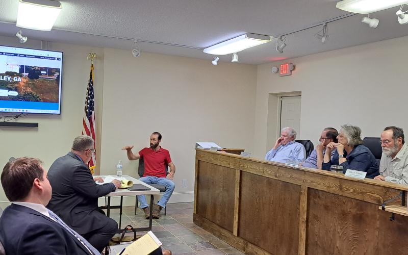 Megan Horn/The Clayton Tribune. Officer Casey Brown was reinstated as a Sky Valley Police Officer after a special called personnel hearing with Sky Valley Council members Oct. 30. Pictured is Brown speaking under oath about his time as an officer.