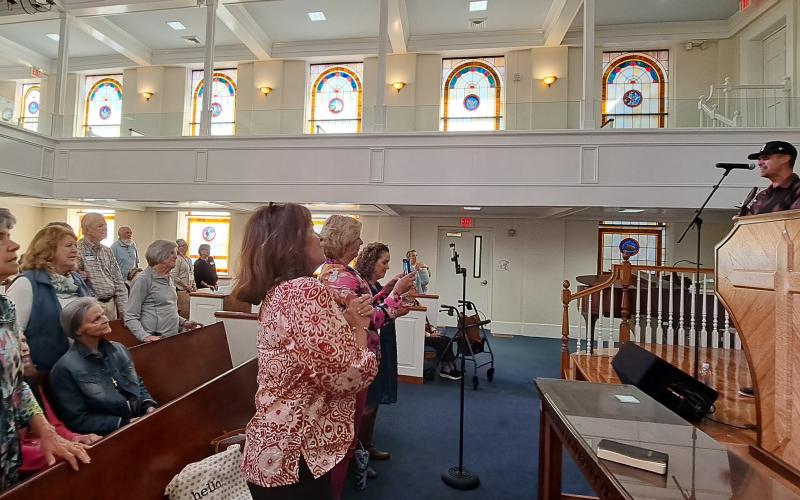 Megan Horn/The Clayton Tribune. A well-attended crowd was emotional, praising Jesus as singer/songwriter Kristian Stanfill was a guest performer for the Ladies’ Community Bible Study group at Clayton Baptist Church on Oct. 10. Stanfill has local ties to the Rabun County community.