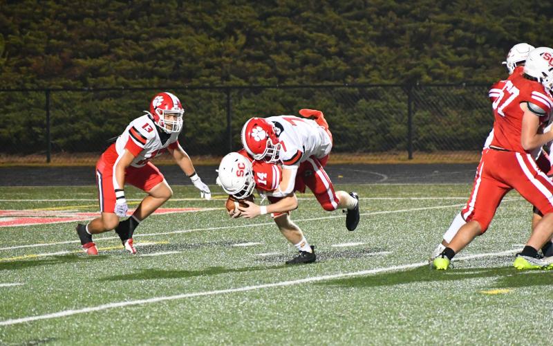Wade Cheek/The Clayton Tribune. Wildcat senior Riley Stewart makes a tackle on Social Circle’s Sean Crews on Nov. 10 in the GHSA first-round playoff game as Rabun County claims a 56-17 win. RCHS plays at Whitefield Academy Friday.
