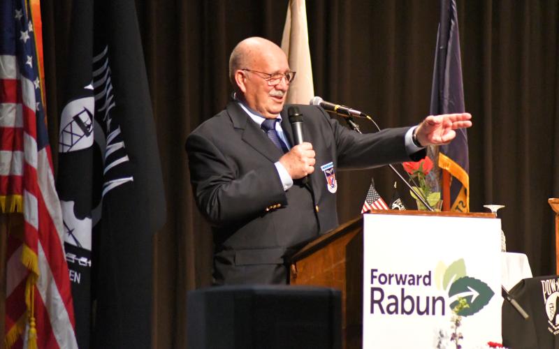 Enoch Autry/The Clayton Tribune. Appreciation dinner guest speaker Dr. Joe Milligan tells the audience about him being a fighter pilot who was shot down in North Vietnam and served as a prisoner of war for nearly six years.