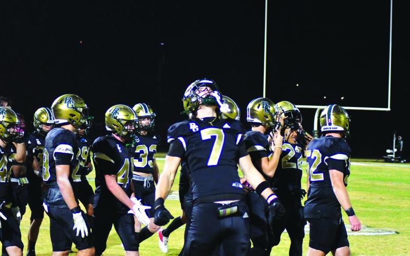 Enoch Autry/The Clayton Tribune. A rematch of Rabun Gap and Providence Day will be for the NCISAA state title at Rabun Gap Friday. ABOVE: Marshall Pritchett releases some emotion after the Eagles defeat the Christ School 56-17 in the semifinals.