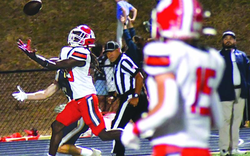 Enoch Autry/The Clayton Tribune. RCHS senior defensive back Willie Goodwyn intercepts a Whitefield Academy pass in the Wildcats’ 42-14 win over the WolfPack to advance to the state quarterfinals. The Wildcats will travel to Brooks County the day after Thanksgiving for a battle of two Elite Eight teams.