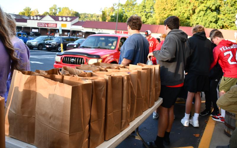 Megan Horn/The Clayton Tribune. The Rabun County Sheriff’s Office along with the Clayton Police Department and faith-based organizations partnered with the Food Bank of Northeast Georgia and distributed 235 bags of food Oct. 7 during the Faith and Blue Community Distribution.