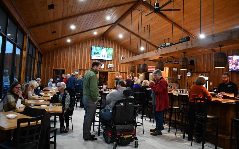 Megan Horn/The Clayton Tribune. Sen Bo Hatchett speaks with citizens at Moonrise Distillery during a Town Hall meeting Monday, Nov. 13.
