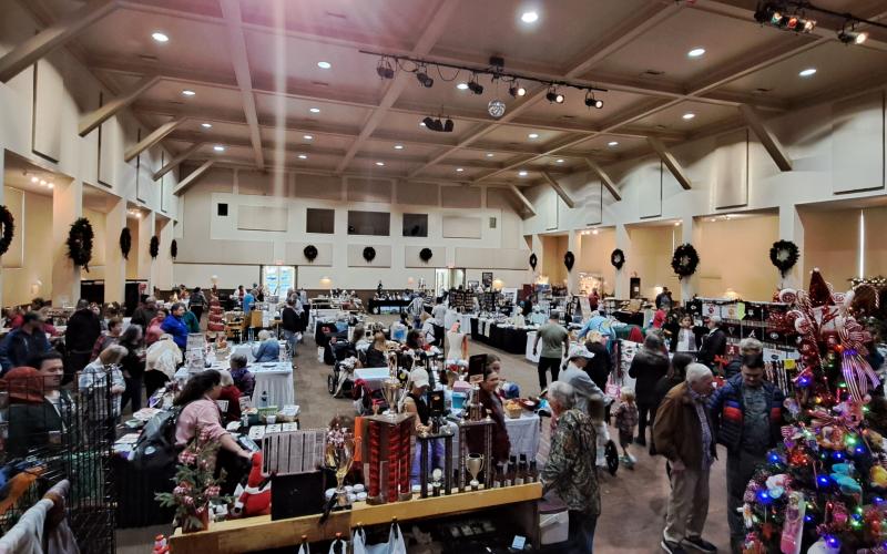 Megan Horn/The Clayton Tribune. Crowds of people worked on their holiday shopping during the annual Holiday Market and Festival of Trees Nov. 24 and 25. The Festival of Trees raised $10,573 for Rabun Paws 4 Life.