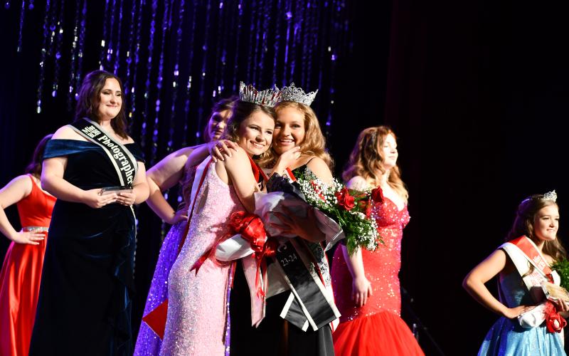 Megan Horn/The Clayton Tribune. Ashlynn York Blackwell is crowned 2023-2024 Miss RCHS at the Oct. 28 Scholarship Pageant. Miss RCHS 2022-2023 Rainny Marie Ramey presents Blackwell with her crown, sash and flowers.