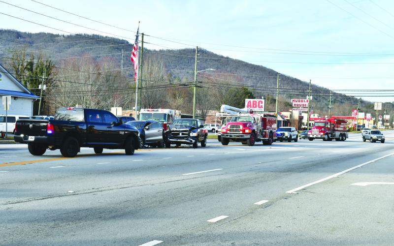 Megan Horn/The Clayton Tribune. Emergency personnel respond to a five-vehicle crash scene on Highway 441 (Ga.15) just before its intersection with East Savannah Street in Clayton Dec. 21. Minor injuries were reported and a Rabun County man was arrested following the crash.