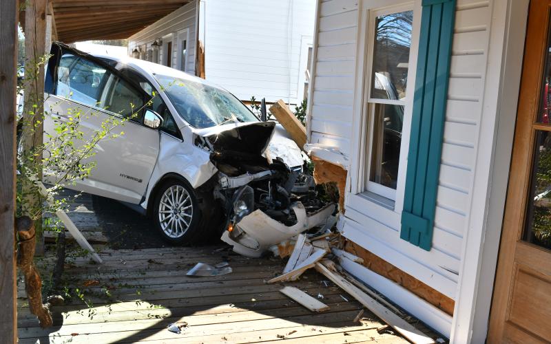 Megan Horn/The Clayton Tribune. A female driver reportedly exited the roadway in Tiger when she had a “medical episode.” The vehicle struck multiple buildings near the Tiger Connector intersection.