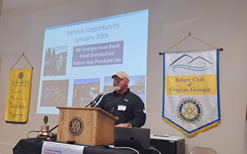 Megan Horn/The Clayton Tribune. Lt. Mark Gerrells of the Rabun County Sheriff’s Office talks to Clayton Rotary members about how to avoid holiday scams.
