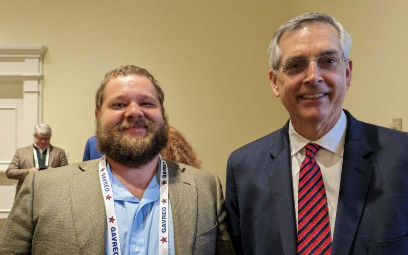 Submitted. Deputy Registrar Derik Pendrey with Georgia Secretary of State Brad Raffensperger.