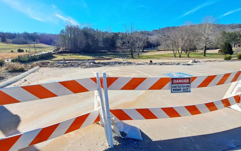 Megan Horn/The Clayton Tribune. Rabun County commissioners approved a $1.4 million bid from Tom Adams Construction to rebuild the golf pro shop building. With commissioners hopeful work will start at the end of January, the project will take about 10 months to complete. It will be the third building on the same spot.