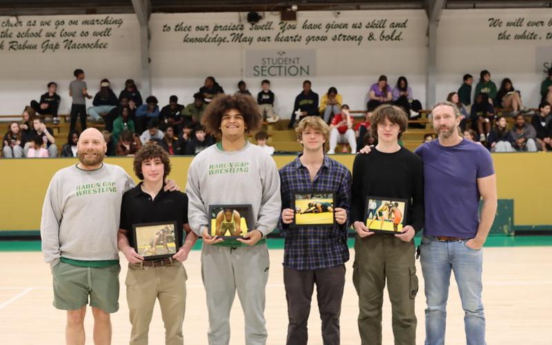 RGNS. Rabun Gap grappling seniors with the RGNS wrestling coaching staff.