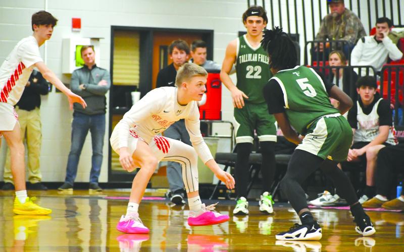 Wade Cheek/The Clayton Tribune. RCHS hoops freshman Landan Bedingfield guards the perimeter during a Feb. 9 matchup between the Wildcats and the Tallulah Falls School Indians. The 72-57 victory gave RCHS a top-spot in the region, tied with Athens Christian.