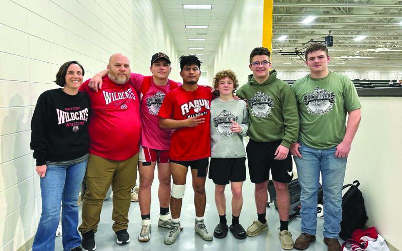 Submitted. Wrestling coaches Brent and Jenna Hinkel stand with the five Wildcats who qualified for the GHSA wrestling state championship that will be held from today, Feb. 15 through Feb. 17. The wrestlers are (from left) following Hinkel; Celton Littrell, Rodolfo Ramos, Bryson Hunt; Justin Cody and Evan Hopper.