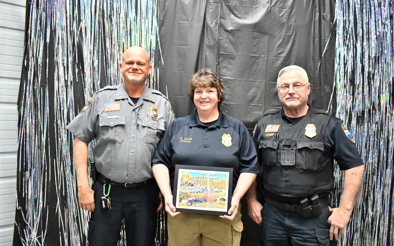 Best First Responder Dottie Clark with Sky Valley Police Chief Vaughn Estes and David Edwards.