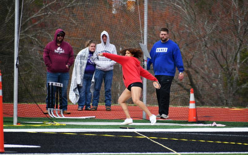 Wade Cheek/The Clayton Tribune. Lady Cat junior Vivian Fisher prepares to sling a discus into the distance during the discuss event at the ninth-annual Bo James Invitational. Fisher placed third in the discuss event with a mark of 89 feet and eight inches.