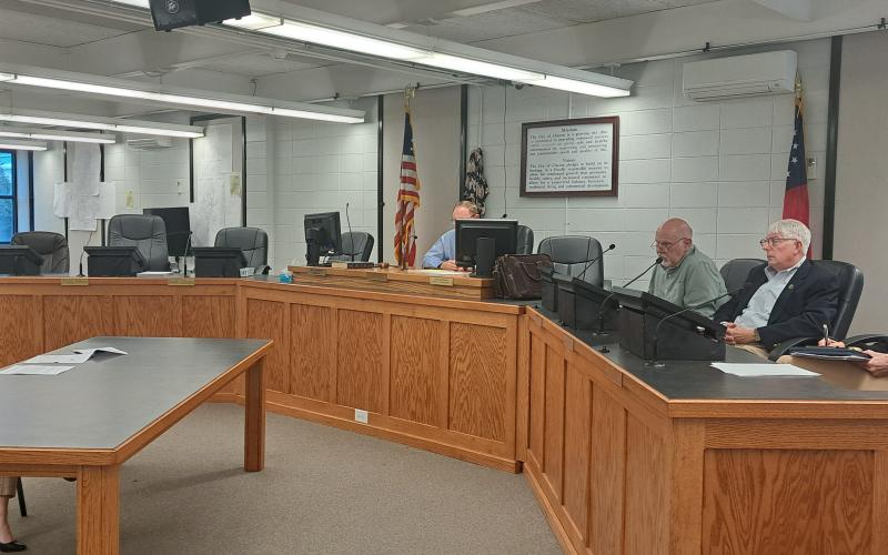 Megan Horn/The Clayton Tribune. Council member Amanda Harrold (far left) speaks to Clayton City Ethics Committee members Broderick Crawford, Carl Butler and Libby Jones Farley; and City Attorney Mitch Baker during Tuesday’s public hearing.