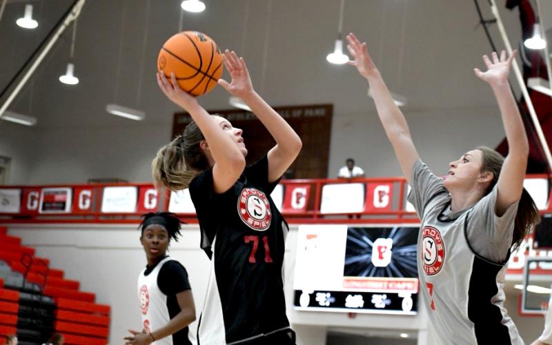 Wade Cheek/The Clayton Tribune. Tallulah Falls School rising senior Breelyn Wood rises above a defender to attempt a 2-point floater during the Sandy’s Spiel Showcase last Sunday, March 17. Wood is a 5-foot-10 wing for the Lady Indians basketball team.