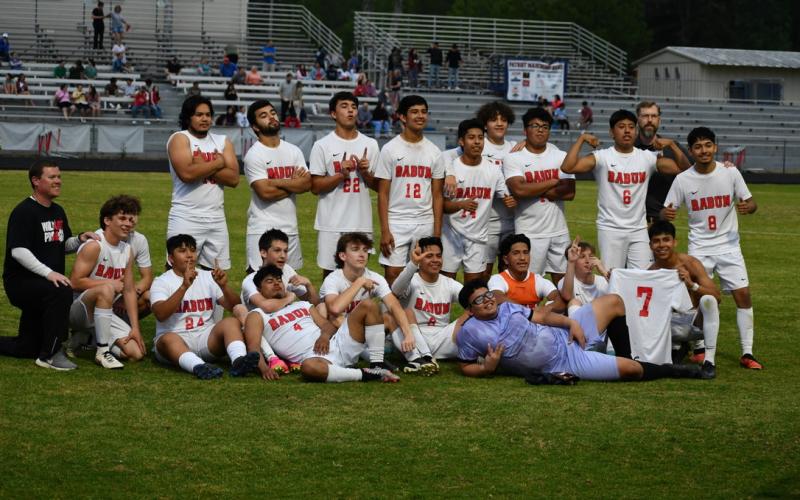 Wade Cheek/The Clayton Tribune. The RCHSsoccer team strikes a pose to celebrate their first round postseason win over Oglethorpe County; the Wildcats were later eliminated by Atlanta power Atlanta International on Wednesday, April 24.