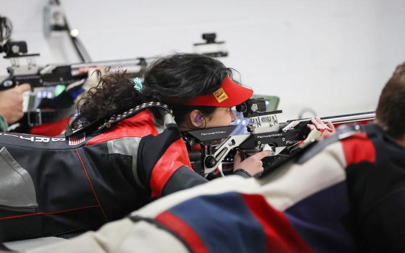 TFS Athletics. TFS senior marksman Brianna Walter lines up a shot during one of the TFS rifle team’s matches this past season.